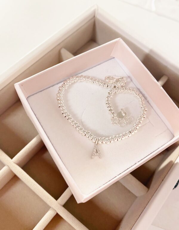Bracciale rondelle lisce e letterina