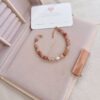 Bracciale pietre terracotta e perla - immagine 2