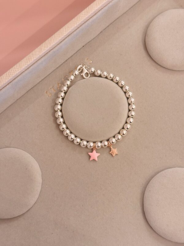 Bracciale sfere doppia stellina rosa