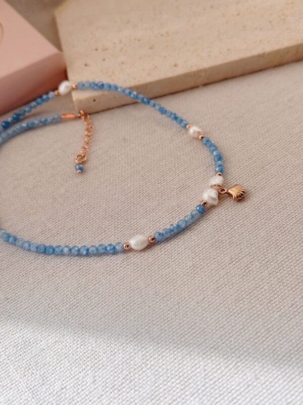 Collana zirconi acqua marina e conchiglia - immagine 2
