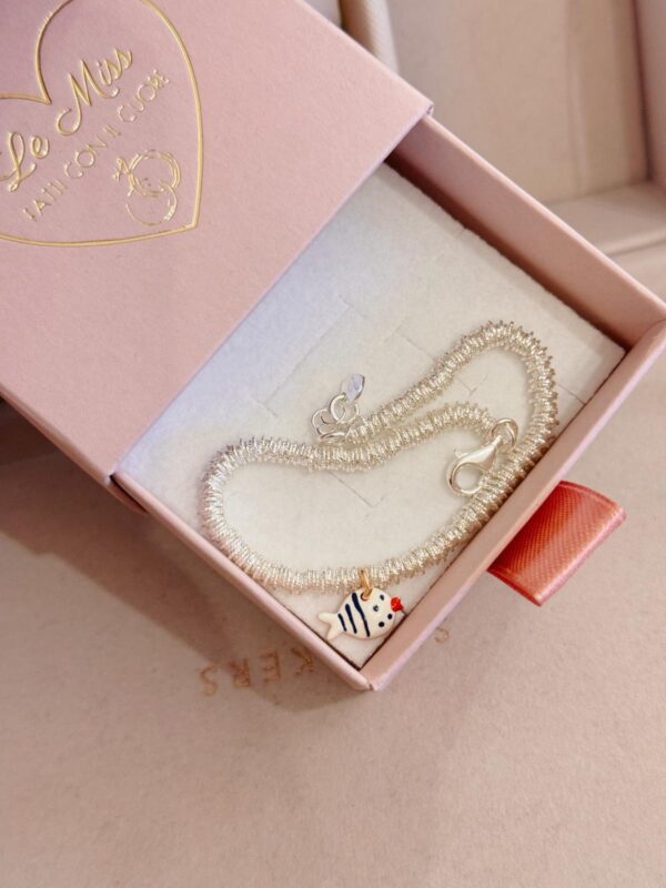 Bracciale rondelle diamantate pesciolino